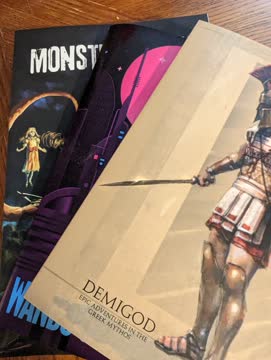 Collection of tabletop game rulebooks for market research